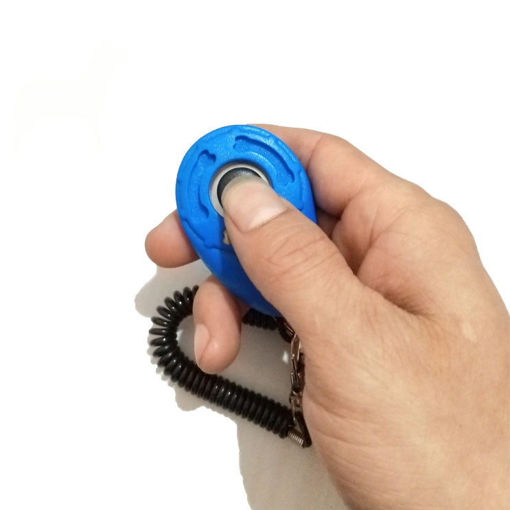 Clicker de dressage pour chien - tenu en main